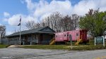 The large tree on front of the caboose is gone after the storm
